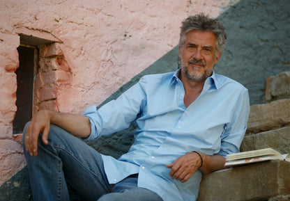 Een of twee knoopjes van je overhemd los